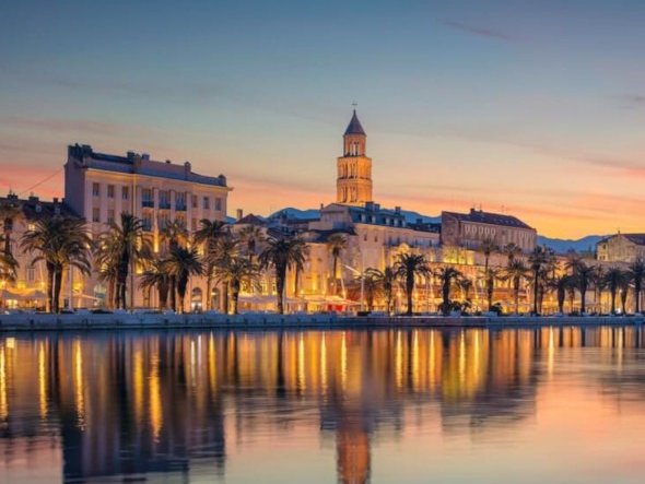 Split Riva waterfront and bell tower at sunset, Croatia