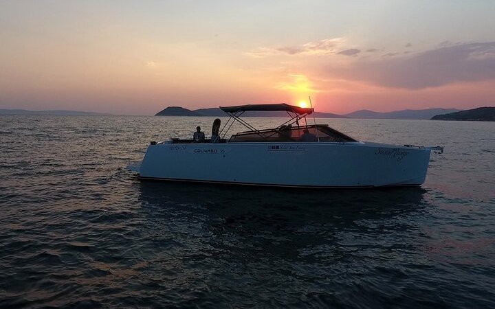 Colnago 35 powerboat cruising at sunset on a private boat tour from Split